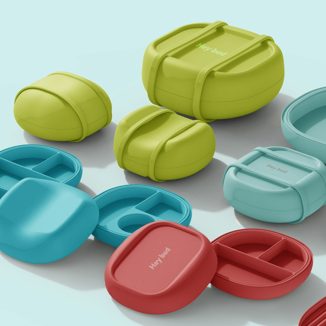 A colorful collection of kids storage containers, from lunch boxes to pencil cases.
